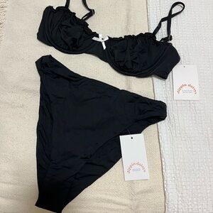 Selling this Dippin Daisys bikini top and bottom (both a size medium)